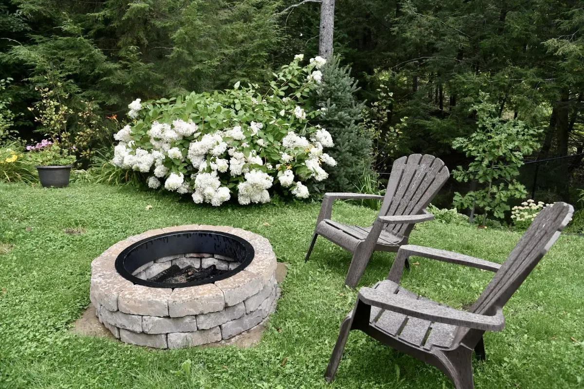 A garden border beside an outdoor seating area